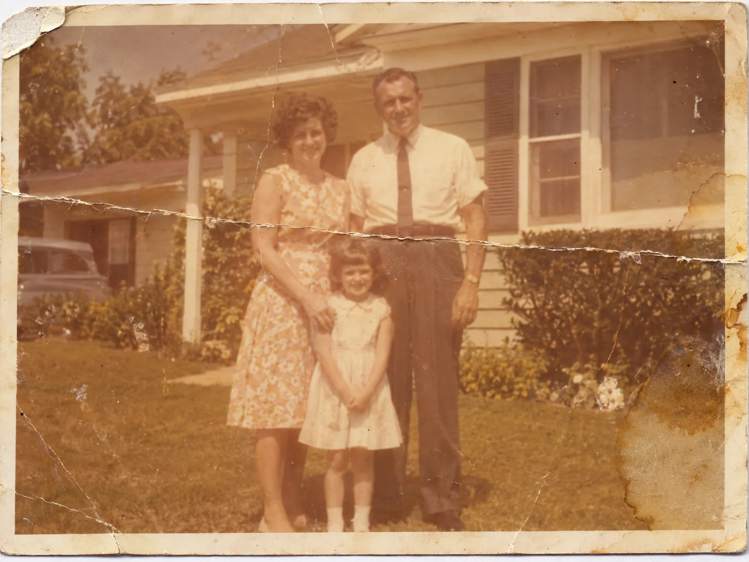 Photo Restoration — a creased 1960s print, repaired — before